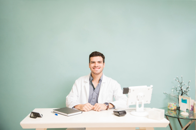 man sitting and smiling